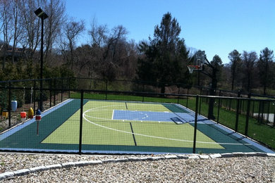 Inspiration for a large traditional backyard full sun outdoor sport court in Boston with with outdoor playset.
