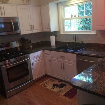 cabinet refacing with glass tile backsplash