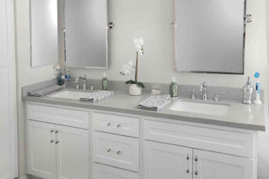 Trendy master double-sink bathroom photo in San Diego with shaker cabinets, white cabinets, quartzite countertops, gray countertops and a built-in vanity