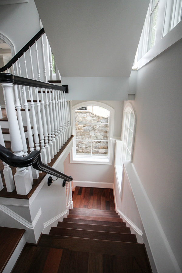Powerful Impression by Floating Staircase in Suburban Foyer