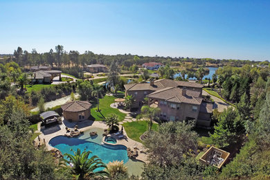 Example of a tuscan exterior home design in Sacramento