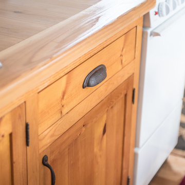 Cedar countertop and knotty pine cabinets