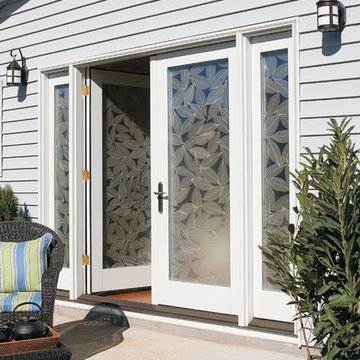 Create a spectacular patio entrance w/Pella® Designer Series® hinged patio doors