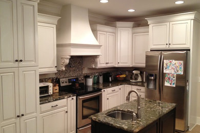 Example of a classic kitchen design in Other