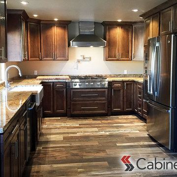 Beautiful Dark Kitchen featuring Belleair Maple Pecan Cabinetry