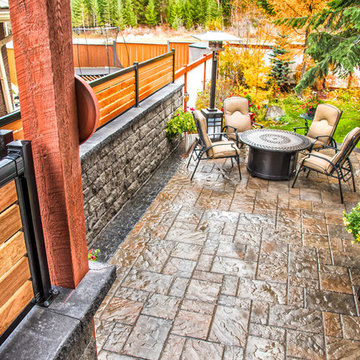 Privacy Screen & Rock Wall Surrounding Patio