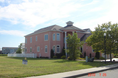 Coastal exterior home idea in Other
