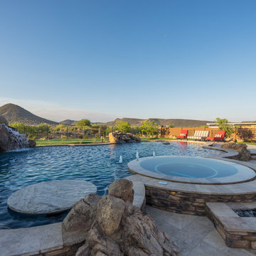 Natural Stone Freeform Pool + Perimeter Overflow Spa
