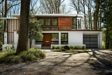 Inspiration pour une façade de maison minimaliste.