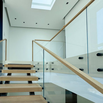 Project #126 | Contemporary Staircases with Integrated LEDs & Glass Railing