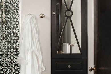 Inspiration for a mid-sized transitional marble tile gray floor walk-in shower remodel in Seattle with raised-panel cabinets, black cabinets, gray walls, an undermount sink, marble countertops and a hinged shower door