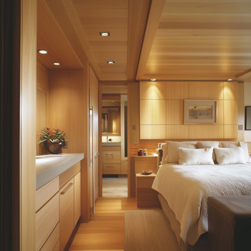 Warm Wood-Toned Bedroom with Custom Millwork – Mountain View Residences