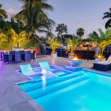 Custom Pool & Spa With Water and Fire Bowls in Pompano Beach