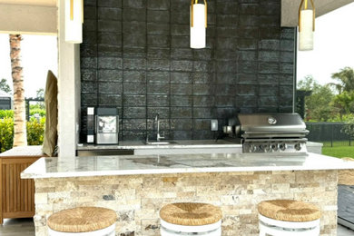 Inspiration for a tropical patio remodel in Miami
