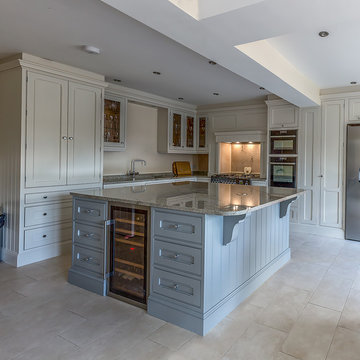 Handmade, hand painted kitchen with Ivory Spice Granite
