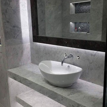 Carrara marble bathroom by ADL Tile and Stone
