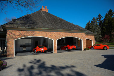 Inspiration for a large contemporary attached three-car carport remodel in Detroit