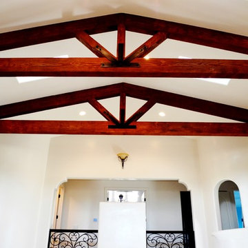 Vaulted ceiling with exposed beam trusses