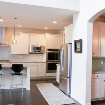 Fresh White Kitchen with Light Gray Tile Backsplash