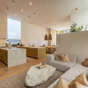 Open Concept Kitchen and Living Space with Soft Neutral Palette