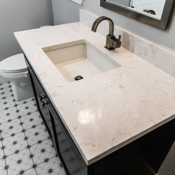 Renowned Vanity, Cambria Countertop, Delta Faucet