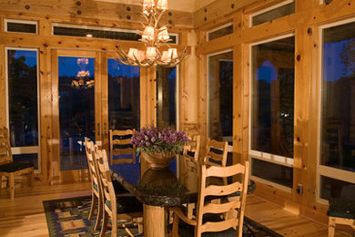 Mountain style dining room photo in Other