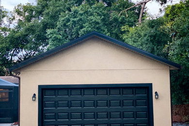 Mid-sized detached two-car garage photo in Tampa