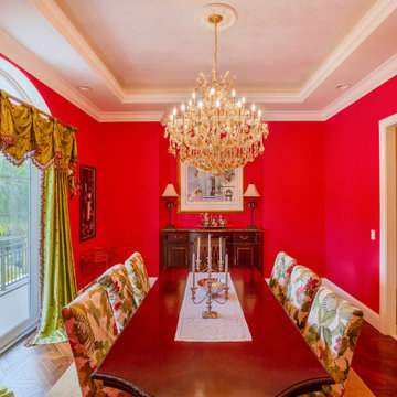 Vibrant Formal Dining Room with Rich Color and Grand Elegance
