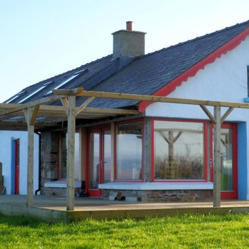 front and side elevations with deck and pergola