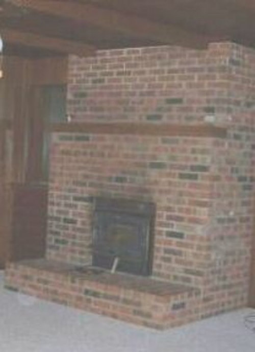 Want to paint ugly brick fireplace
