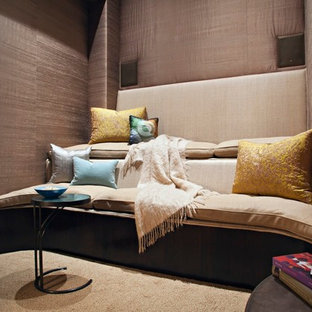 Home theater - small contemporary enclosed carpeted home theater idea in New York with brown walls