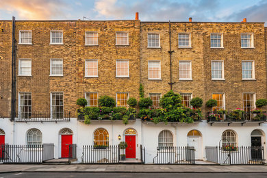 Inspiration for a traditional house exterior in Surrey.