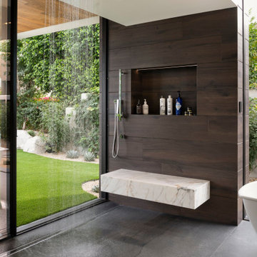 Bighorn Palm Desert luxury modern home primary bathroom glass wall rain shower
