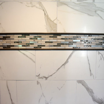 Gray Vanity with Freestanding Tub and Tiled Walkin Shower
