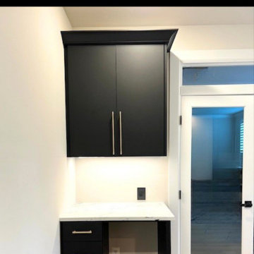Custom Dual Office with Waterfall Island & Integrated Storagehome