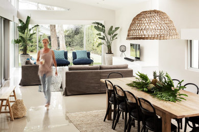 This is an example of a beach style living room in Melbourne.