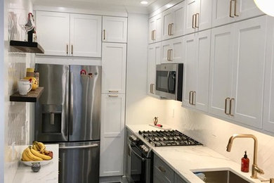 Example of a transitional kitchen design in New York