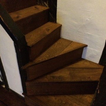 Repair 14 meetrs of reclaimed oak. Sand, stain and seal. Stair ase fitted as an