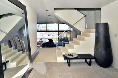Inspiration for a contemporary staircase remodel in Other