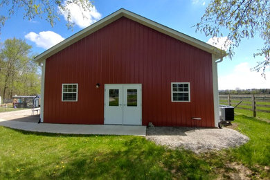 Example of a country exterior home design in Columbus