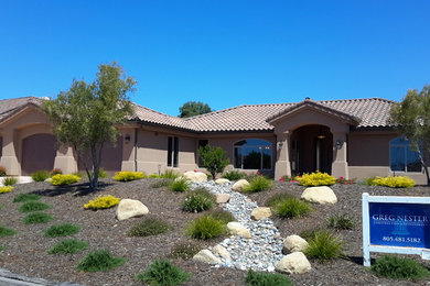 Inspiration for a mediterranean exterior home remodel in San Luis Obispo