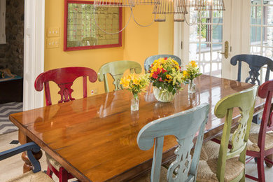 Inspiration for a mid-sized timeless ceramic tile great room remodel in Indianapolis with yellow walls and no fireplace