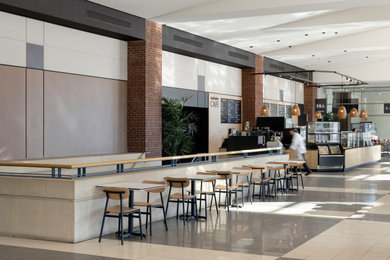 Example of a transitional home bar design in Minneapolis