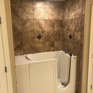 walk in tub with tile surround