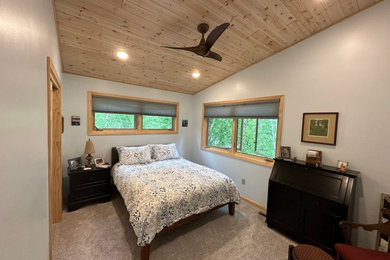 Inspiration for a rustic bedroom remodel in Minneapolis