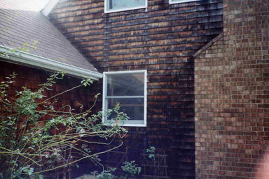 Inspiration for a two-story wood exterior home remodel in Baltimore