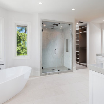 Title: Primary Bathroom with Freestanding Tub & Quartzite Slab Shower – Newport 