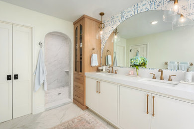 Bathroom - mid-sized eclectic master white tile and porcelain tile porcelain tile, white floor, double-sink and wallpaper bathroom idea in St Louis with flat-panel cabinets, white cabinets, a two-piece toilet, white walls, an undermount sink, quartz countertops, white countertops and a built-in vanity