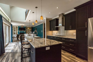 Example of a trendy kitchen design in Other with an island