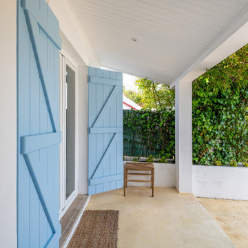 Entrance with Blue Shutters and Garden Wall